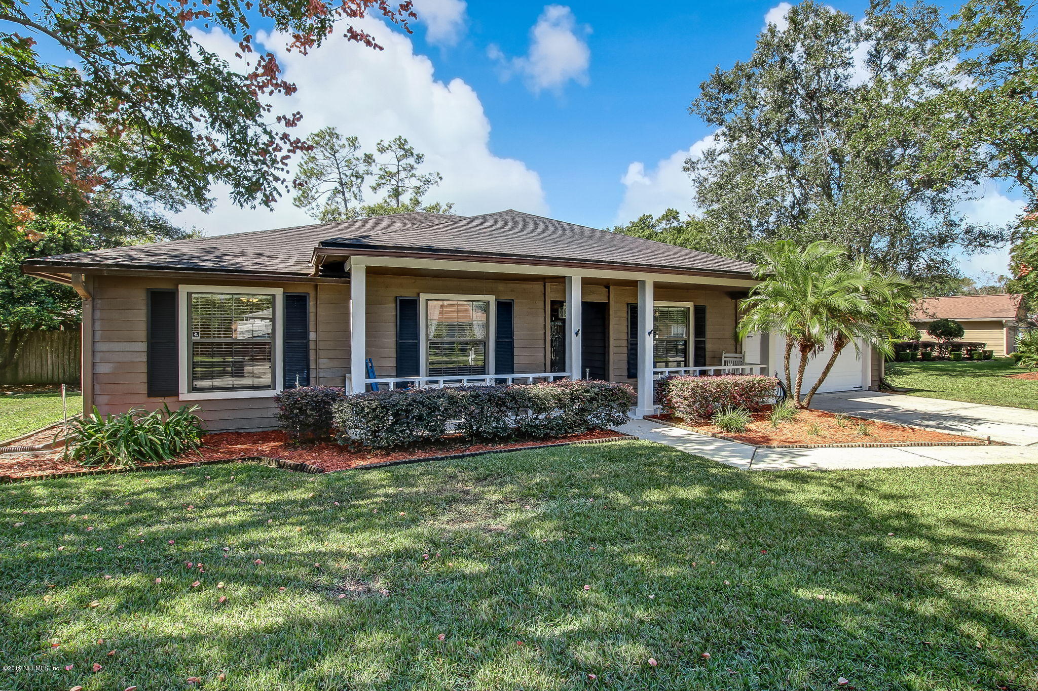 11060 Reading Road Jacksonville, FL 32257 - Photo 4 of 43 a front view of house with yard and green space