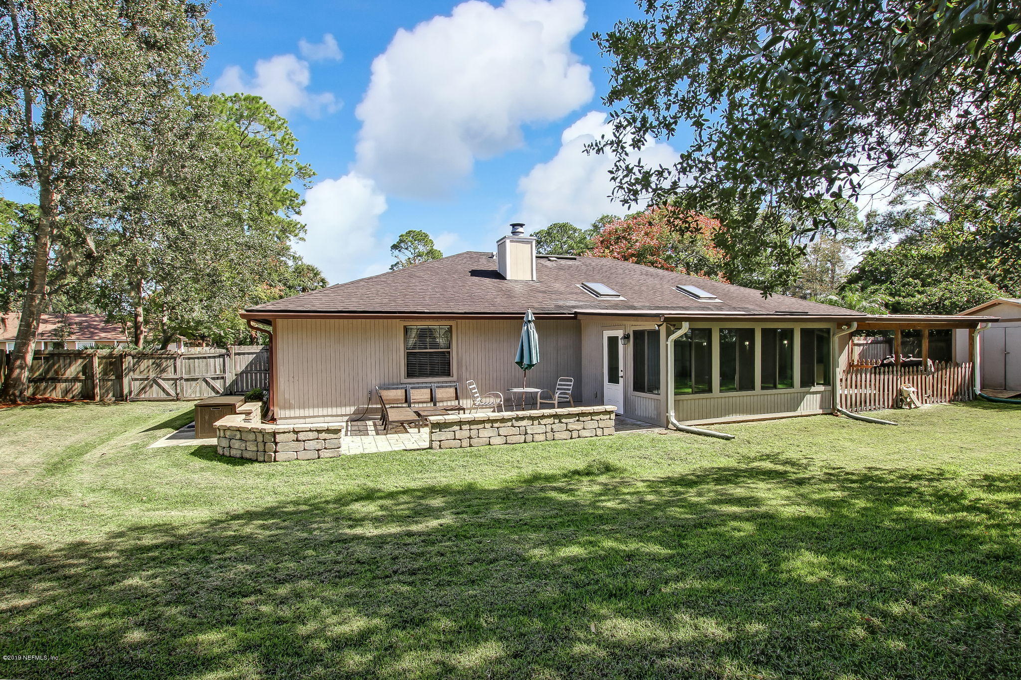 11060 Reading Road Jacksonville, FL 32257 - Photo 41 of 43 a front view of house with yard outdoor seating and green space