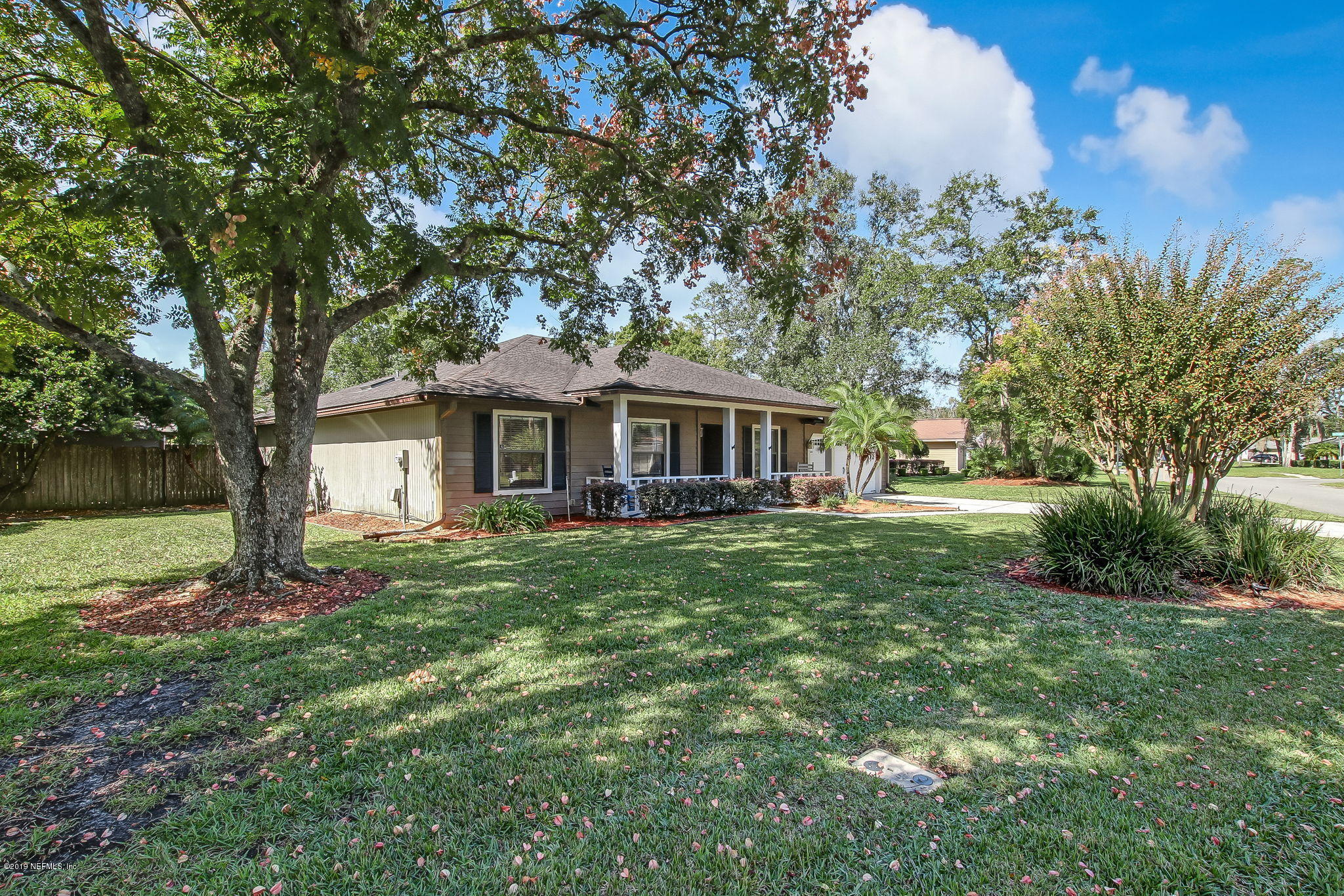 11060 Reading Road Jacksonville, FL 32257 - Photo 5 of 43 a front view of a house with yard and green space