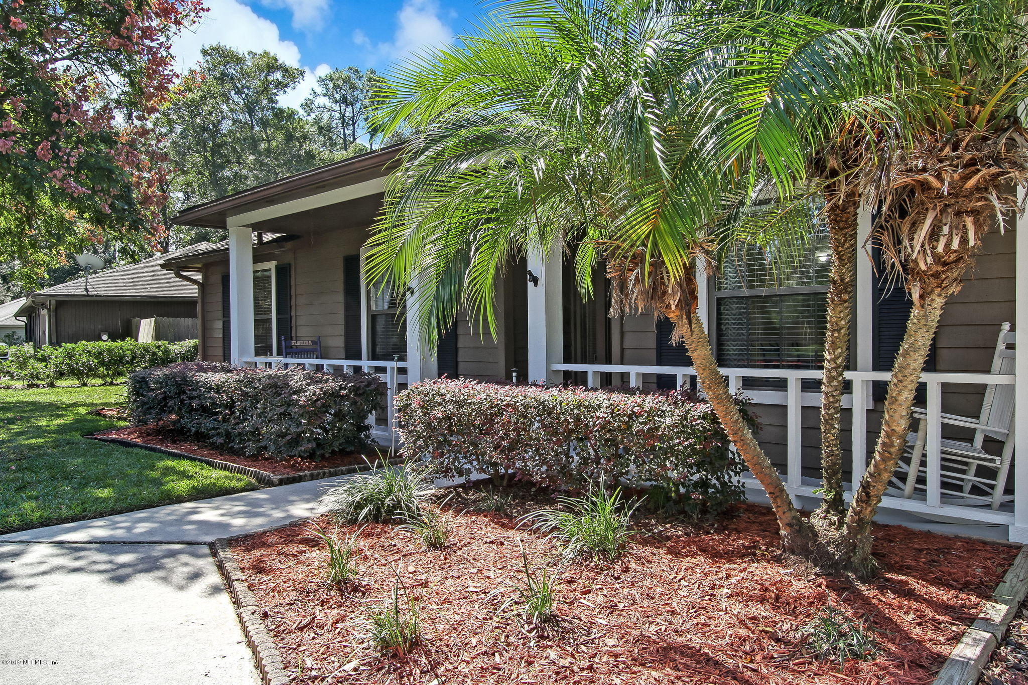 11060 Reading Road Jacksonville, FL 32257 - Photo 6 of 43 a front view of house with small garden
