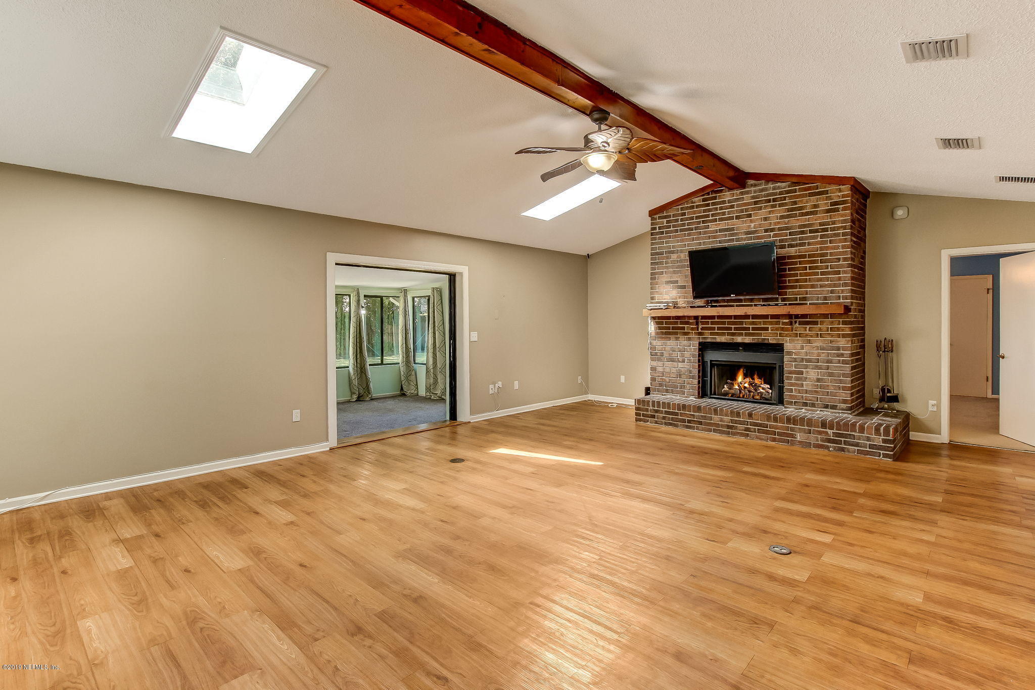 11060 Reading Road Jacksonville, FL 32257 - Photo 10 of 43 a view of empty room with a fireplace