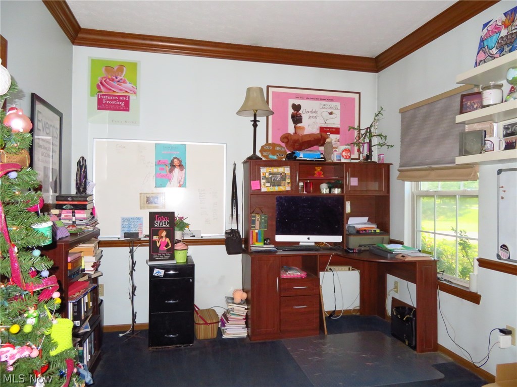 45295 Parsons Road Oberlin, OH 44074 - Photo 22 of 39 The office is conveniently in the front of the house. The ceiling is accented with wood crown molding