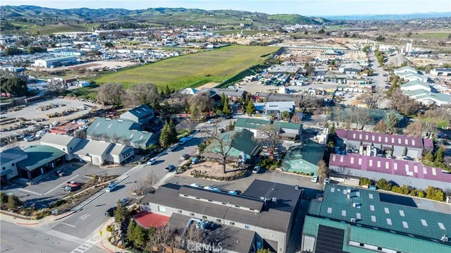 an aerial view of a city with streets and houses