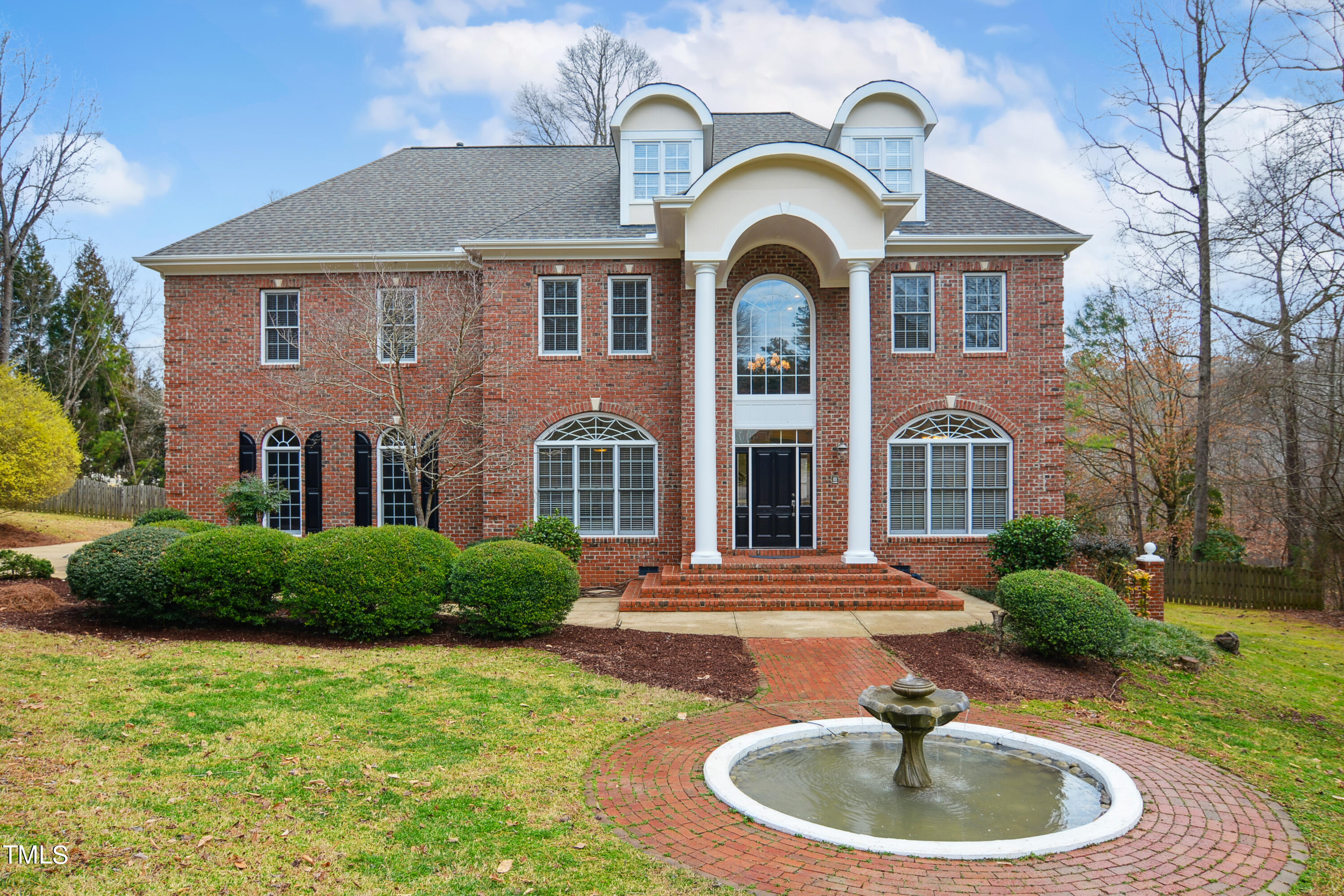 3101 Shinleaf Court Raleigh, NC 27613 - Photo 1 of 44 a front view of a house with garden
