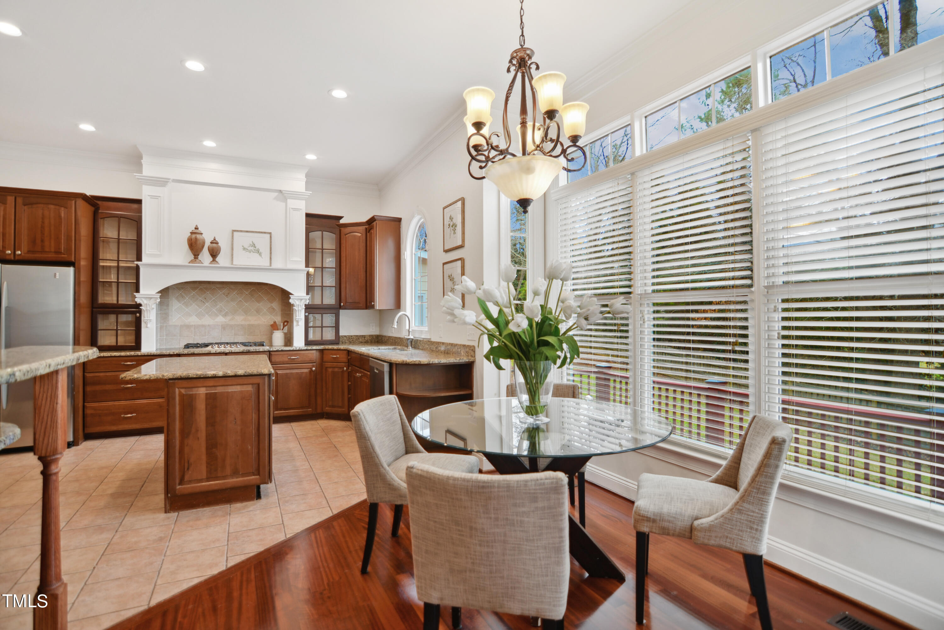 3101 Shinleaf Court Raleigh, NC 27613 - Photo 13 of 44 a dining room with furniture and window