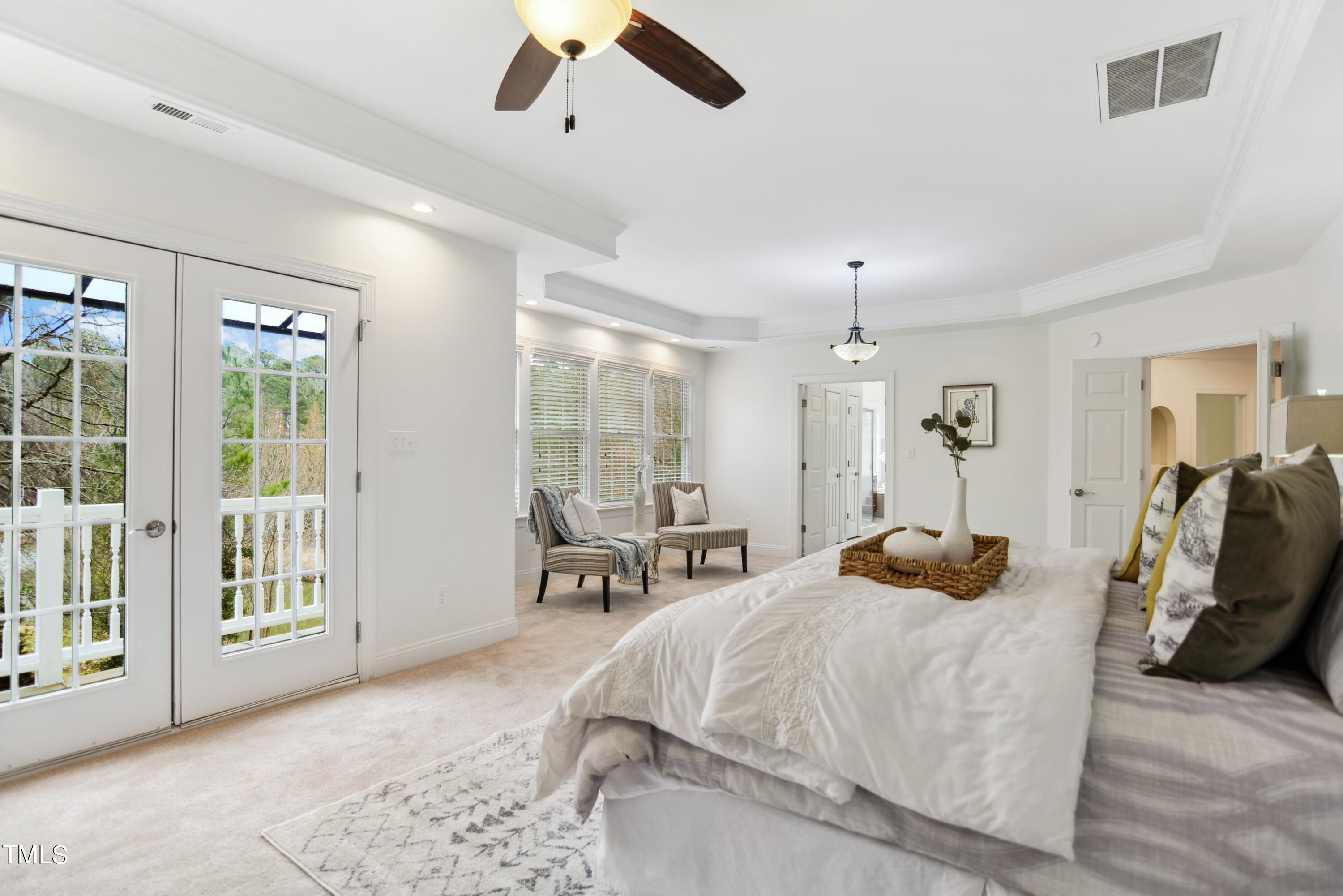 3101 Shinleaf Court Raleigh, NC 27613 - Photo 19 of 44 a bed room with a bed and a chair