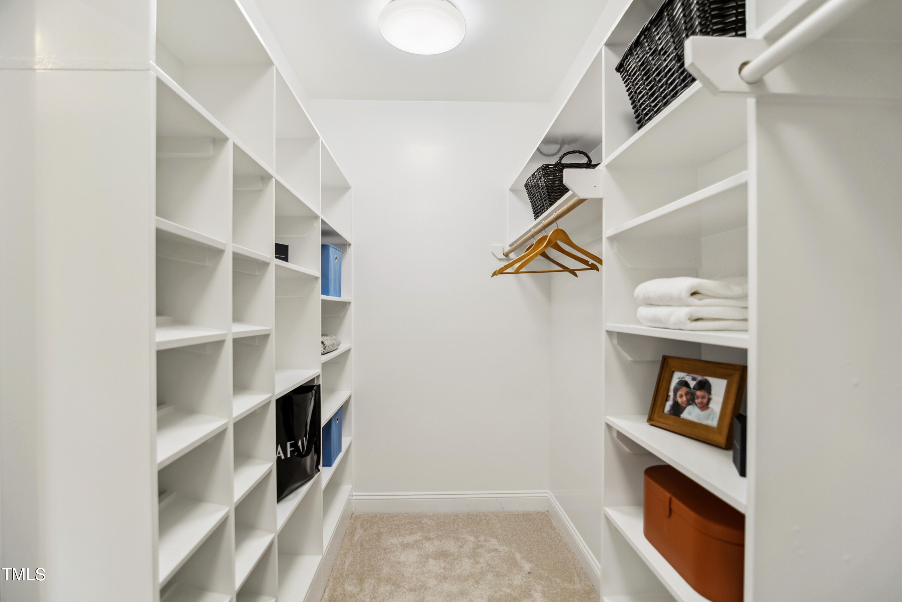 3101 Shinleaf Court Raleigh, NC 27613 - Photo 20 of 44 a view of an empty walk in closet