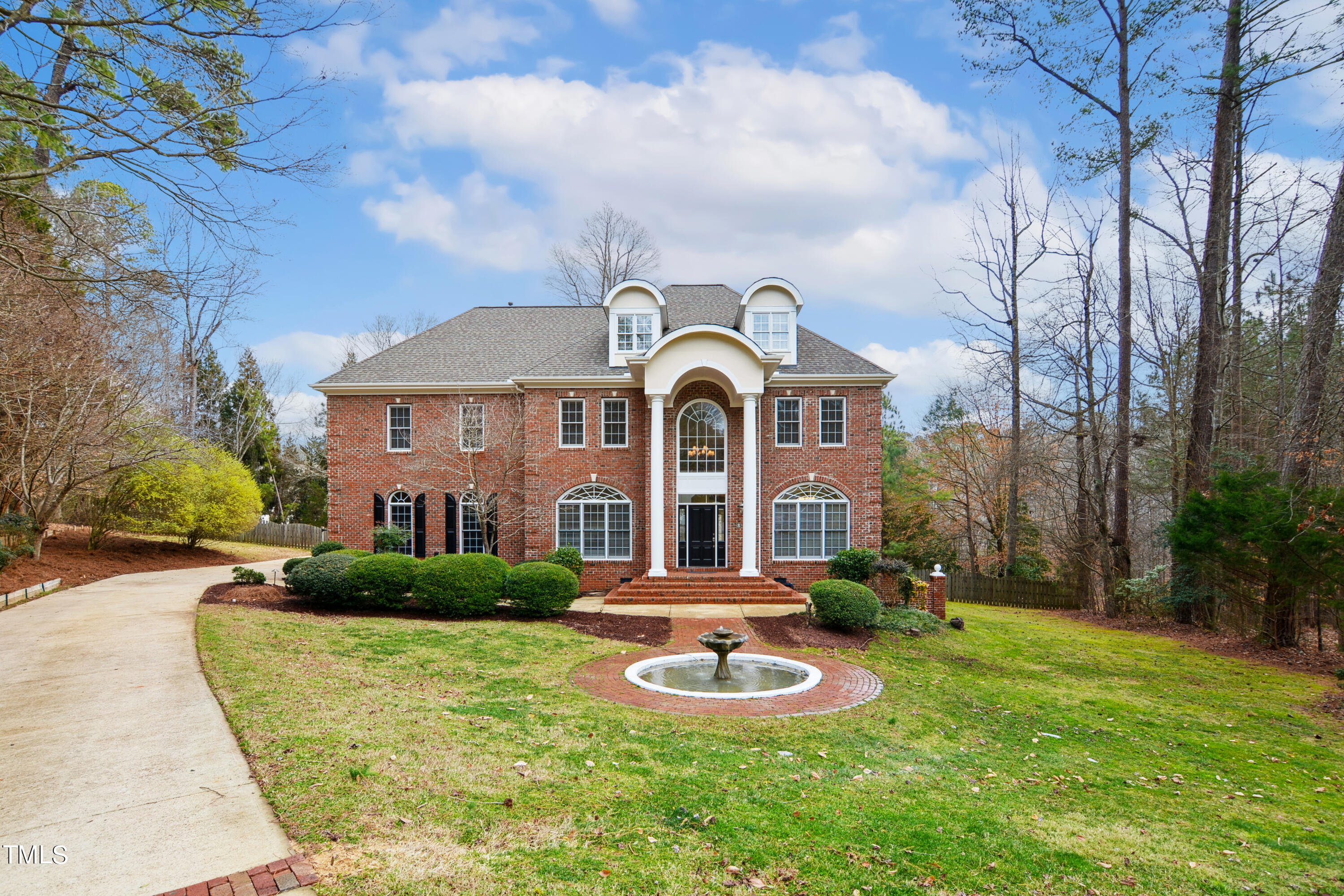 3101 Shinleaf Court Raleigh, NC 27613 - Photo 2 of 44 a front view of a house with yard and green space