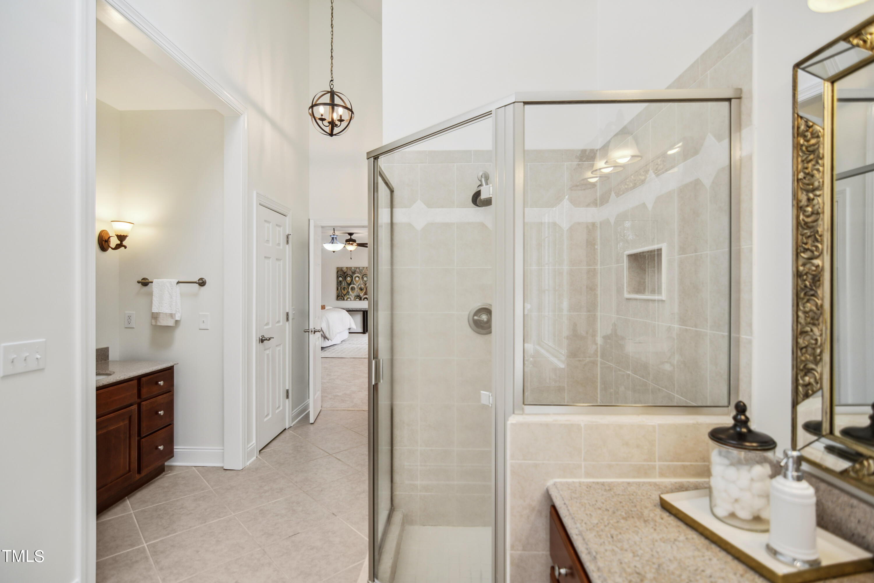 3101 Shinleaf Court Raleigh, NC 27613 - Photo 23 of 44 a bathroom with a sink and a mirror