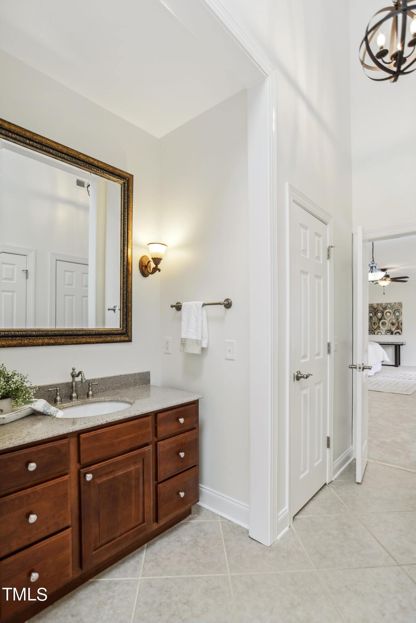 3101 Shinleaf Court Raleigh, NC 27613 - Photo 24 of 44 a spacious bathroom with a double vanity sink a mirror and a shower