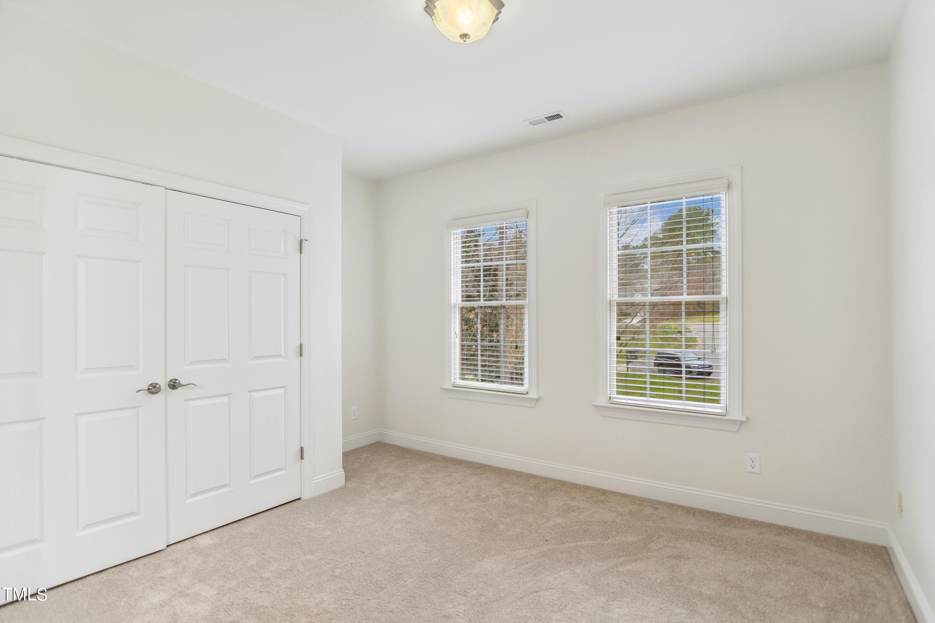 3101 Shinleaf Court Raleigh, NC 27613 - Photo 25 of 44 a view of an empty room with a window