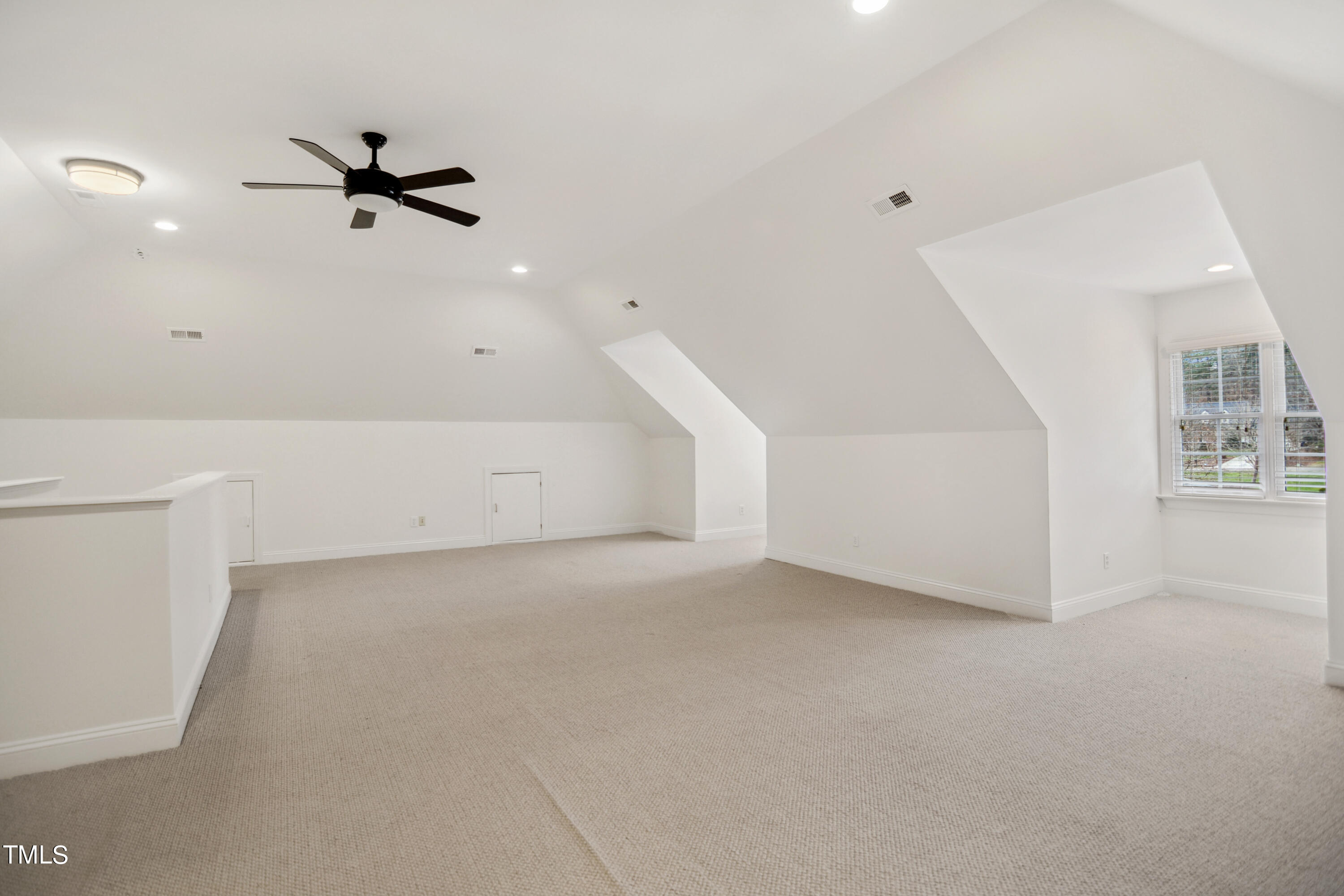 3101 Shinleaf Court Raleigh, NC 27613 - Photo 37 of 44 a view of an empty room with a window