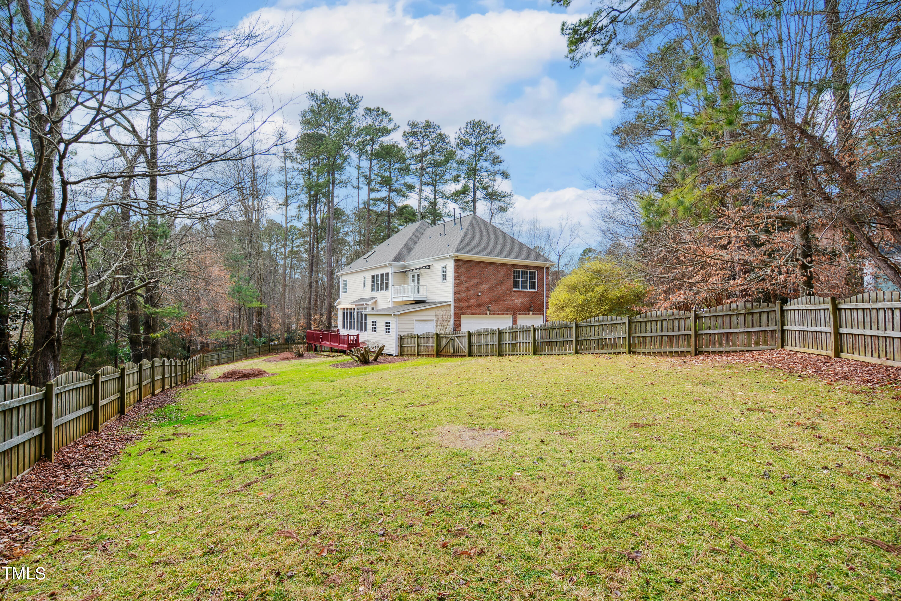 3101 Shinleaf Court Raleigh, NC 27613 - Photo 42 of 44 a yellow house with a yard