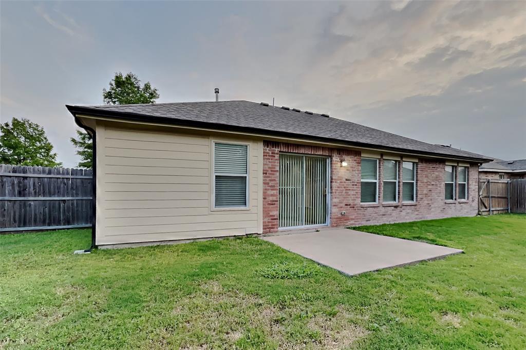 105 Independence Trail Forney, TX 75126 - Photo 17 of 18 a view of a house with a yard