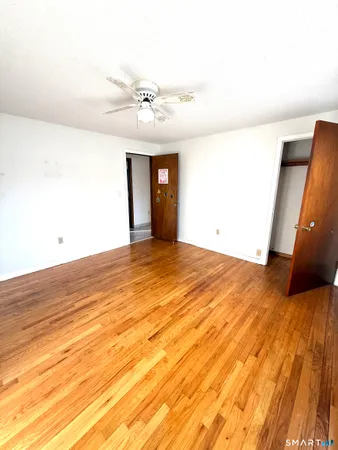 a view of a livingroom with wooden floor