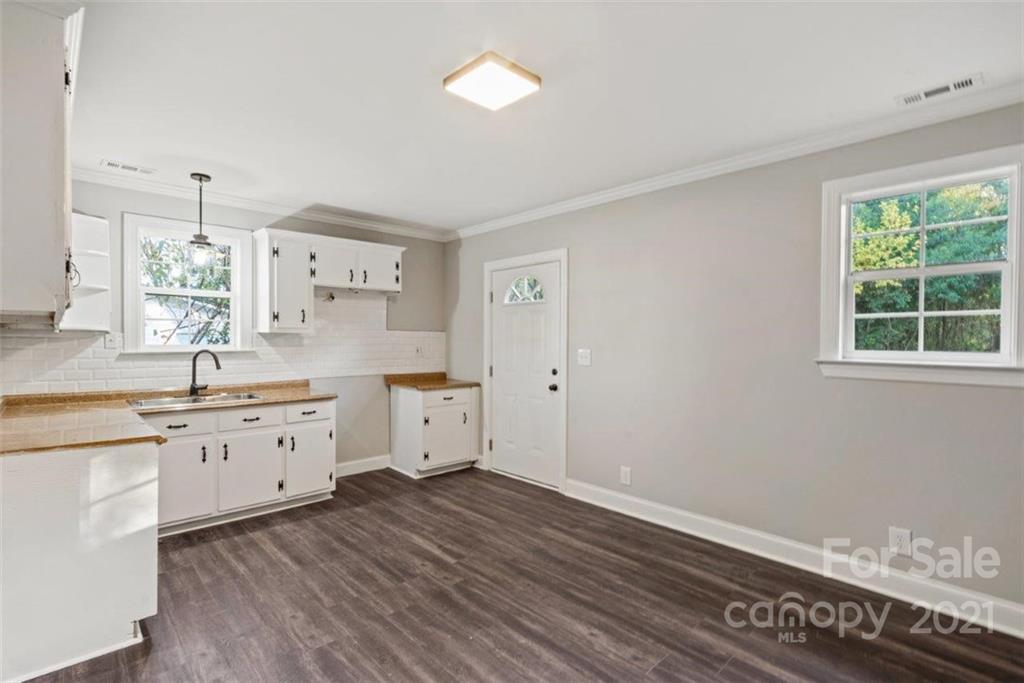 235 Porter Road Rock Hill, SC 29730 - Photo 12 of 29 a large white kitchen with a window