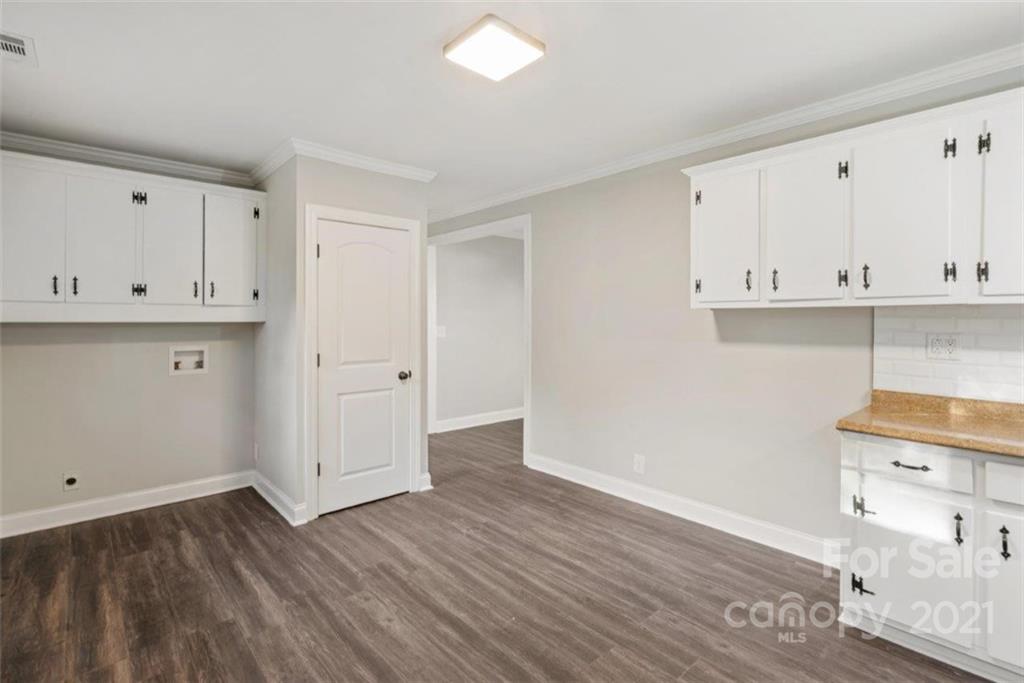 235 Porter Road Rock Hill, SC 29730 - Photo 15 of 29 a view of an empty room with wooden floor