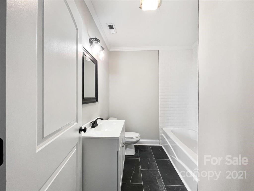 235 Porter Road Rock Hill, SC 29730 - Photo 19 of 29 a bathroom with a sink and a mirror