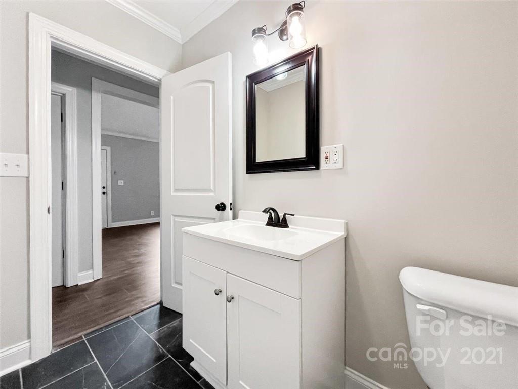 235 Porter Road Rock Hill, SC 29730 - Photo 22 of 29 a bathroom with a sink toilet and mirror