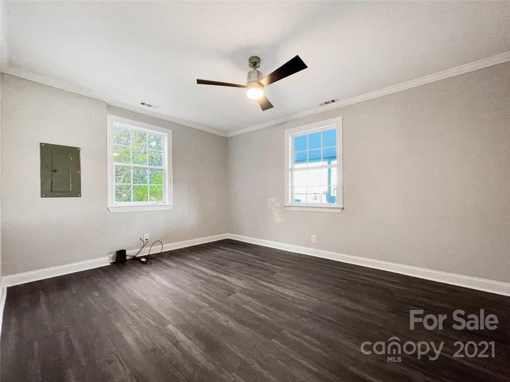235 Porter Road Rock Hill, SC 29730 - Photo 23 of 29 a view of an empty room with wooden floor and a window