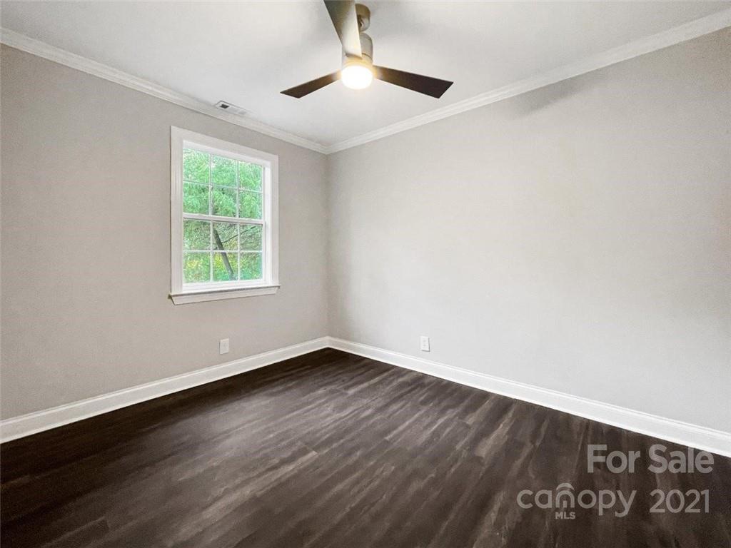 235 Porter Road Rock Hill, SC 29730 - Photo 24 of 29 wooden floor in an empty room with a window