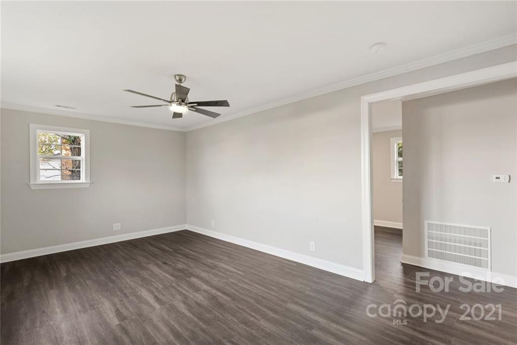 235 Porter Road Rock Hill, SC 29730 - Photo 25 of 29 a view of a room with wooden floor and ceiling fan