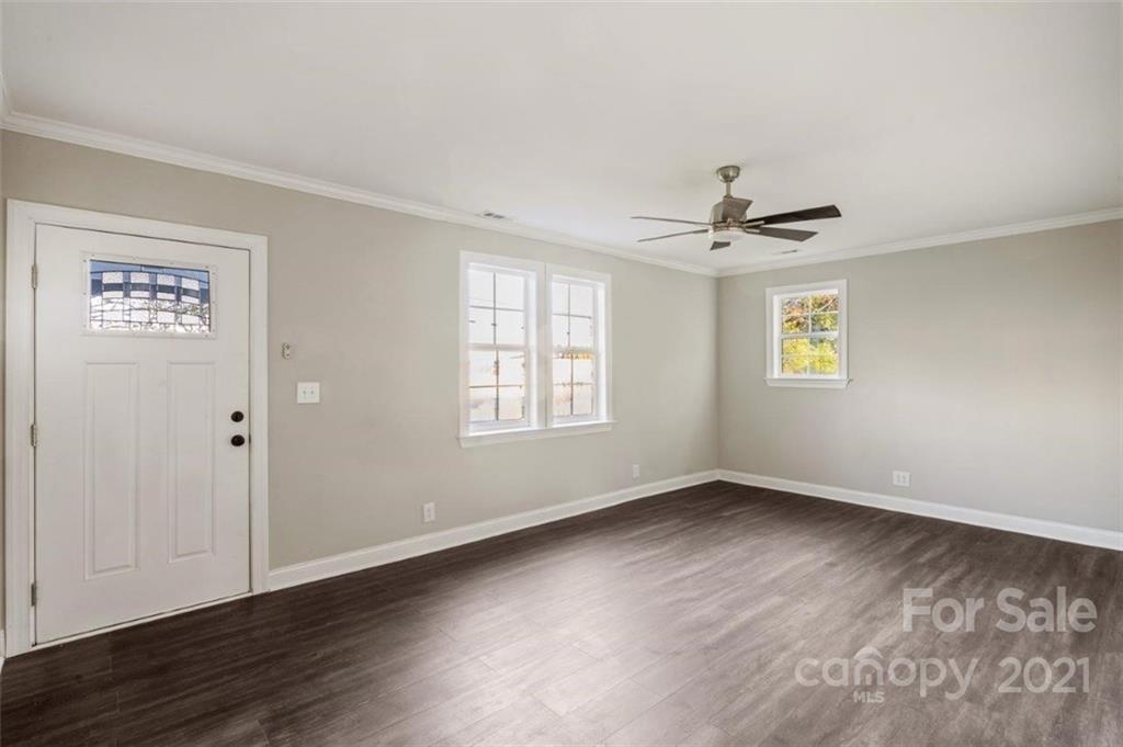 235 Porter Road Rock Hill, SC 29730 - Photo 8 of 29 wooden floor in an empty room with a window
