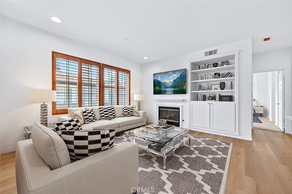 447 Ridgeway Irvine, CA 92620 - Photo 18 of 88 a living room with furniture and a fireplace