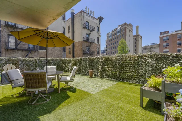 a view of a balcony with city view