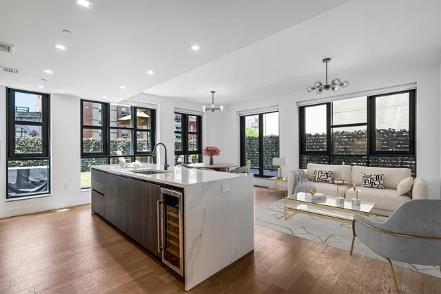 a picture of a bathroom with a shower and a mirror