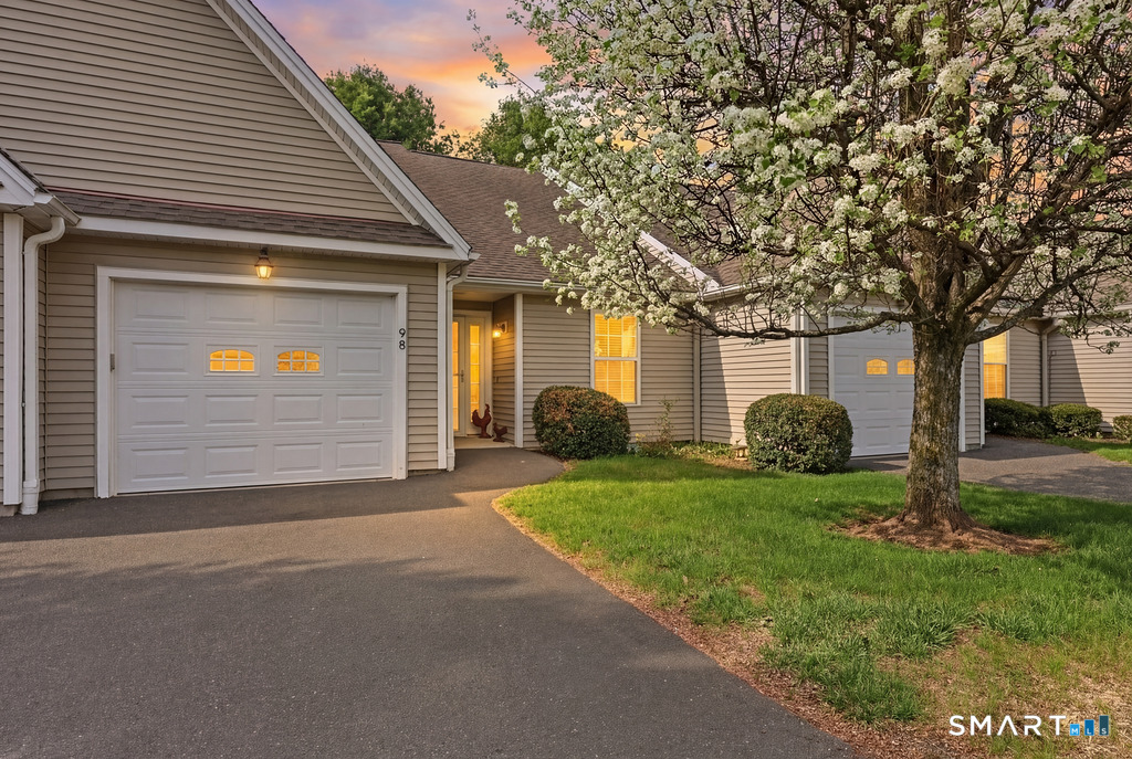 98 Haley Lane, Unit 98 Newtown, CT 06482 - Photo 1 of 33 a front view of a house with garden