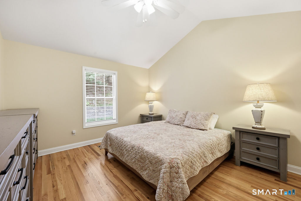 98 Haley Lane, Unit 98 Newtown, CT 06482 - Photo 23 of 33 a bedroom with a bed and a window