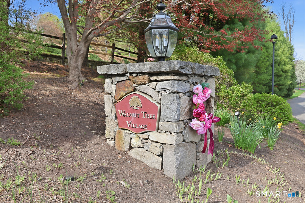 98 Haley Lane, Unit 98 Newtown, CT 06482 - Photo 32 of 33 a sign that is on the side of the road