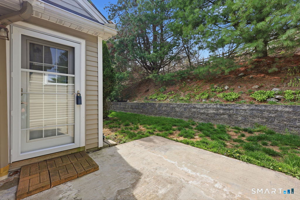 98 Haley Lane, Unit 98 Newtown, CT 06482 - Photo 8 of 33 a view of house with backyard