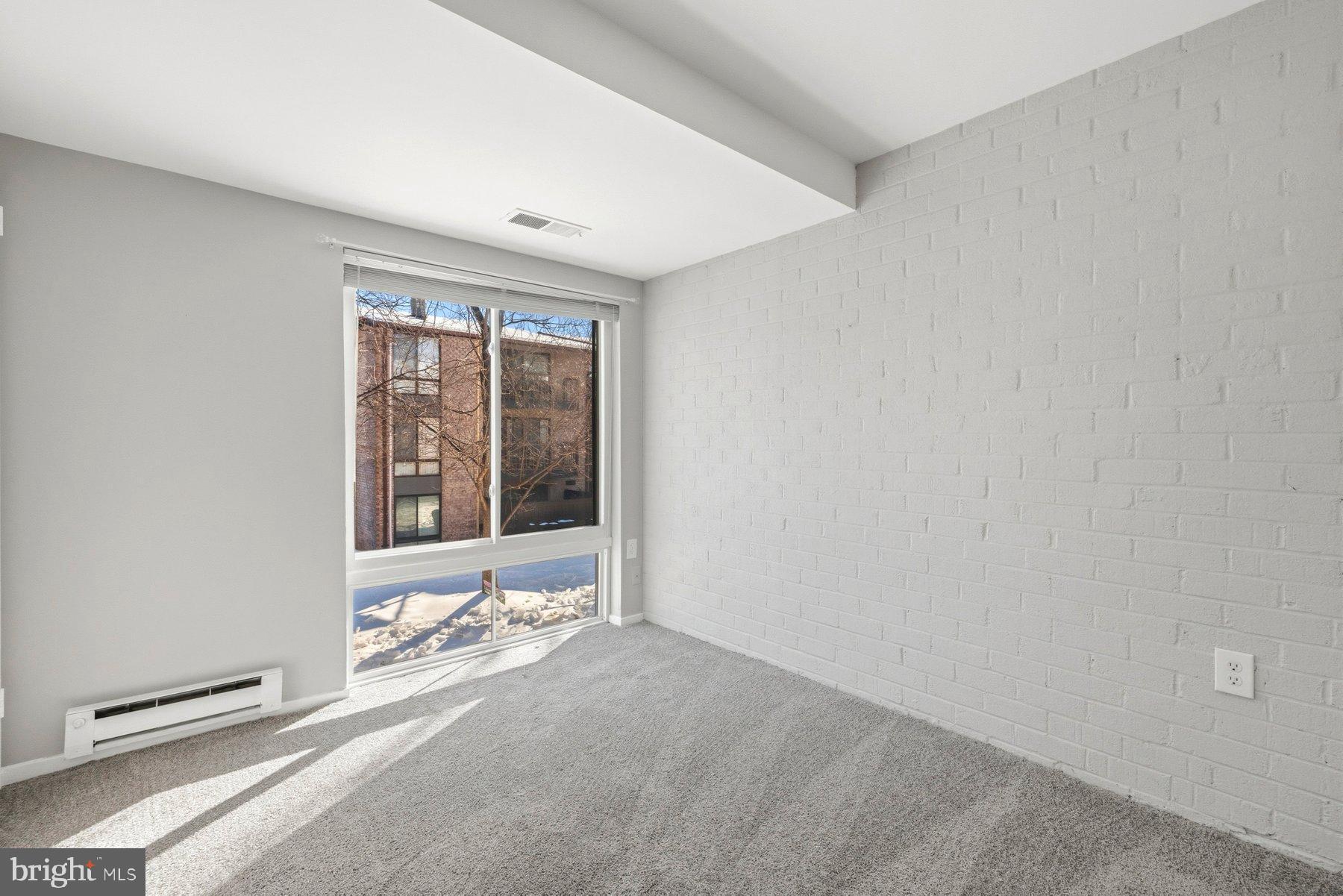 10026 Stedwick Road, Unit 201 Gaithersburg, MD 20886 - Photo 15 of 25 Bright, airy space with natural light.