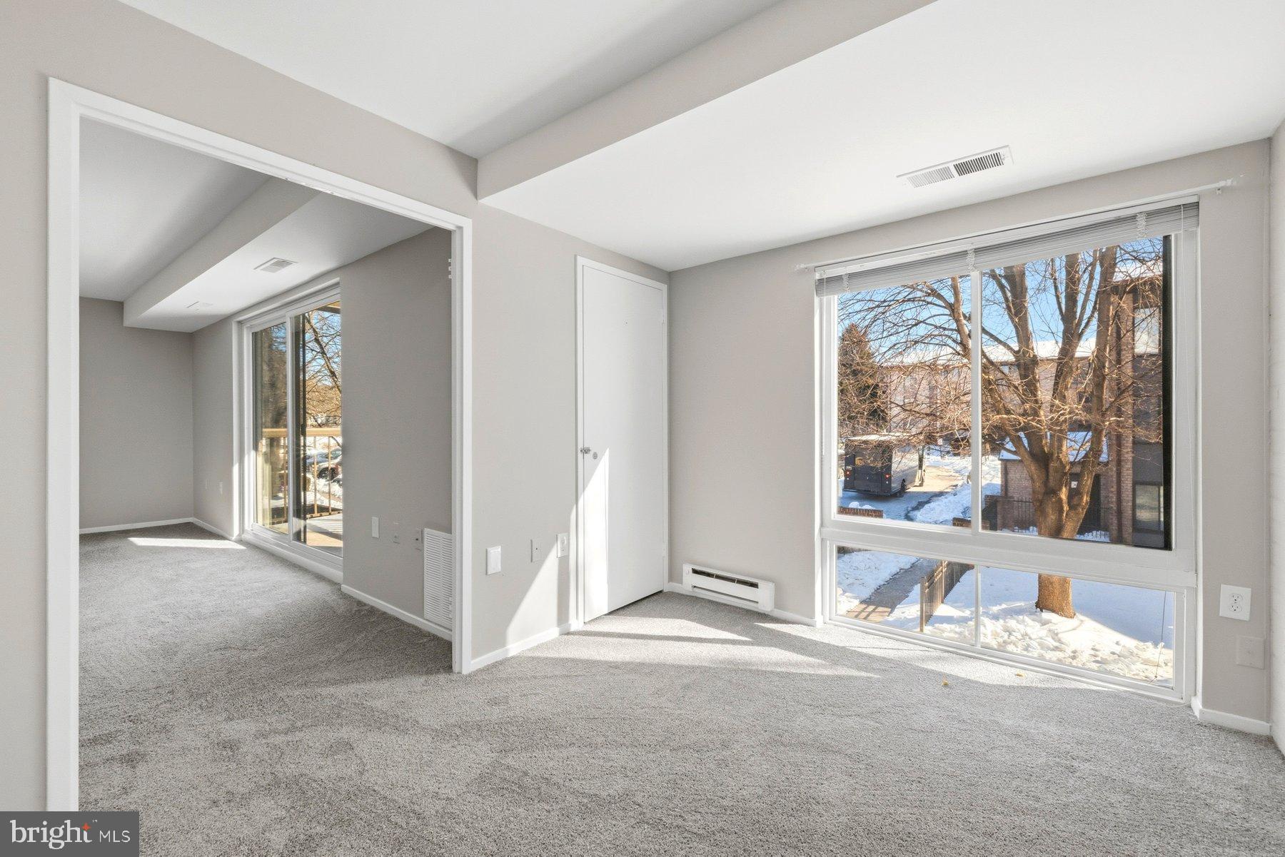 10026 Stedwick Road, Unit 201 Gaithersburg, MD 20886 - Photo 16 of 25 Bright and airy spaces with scenic views.