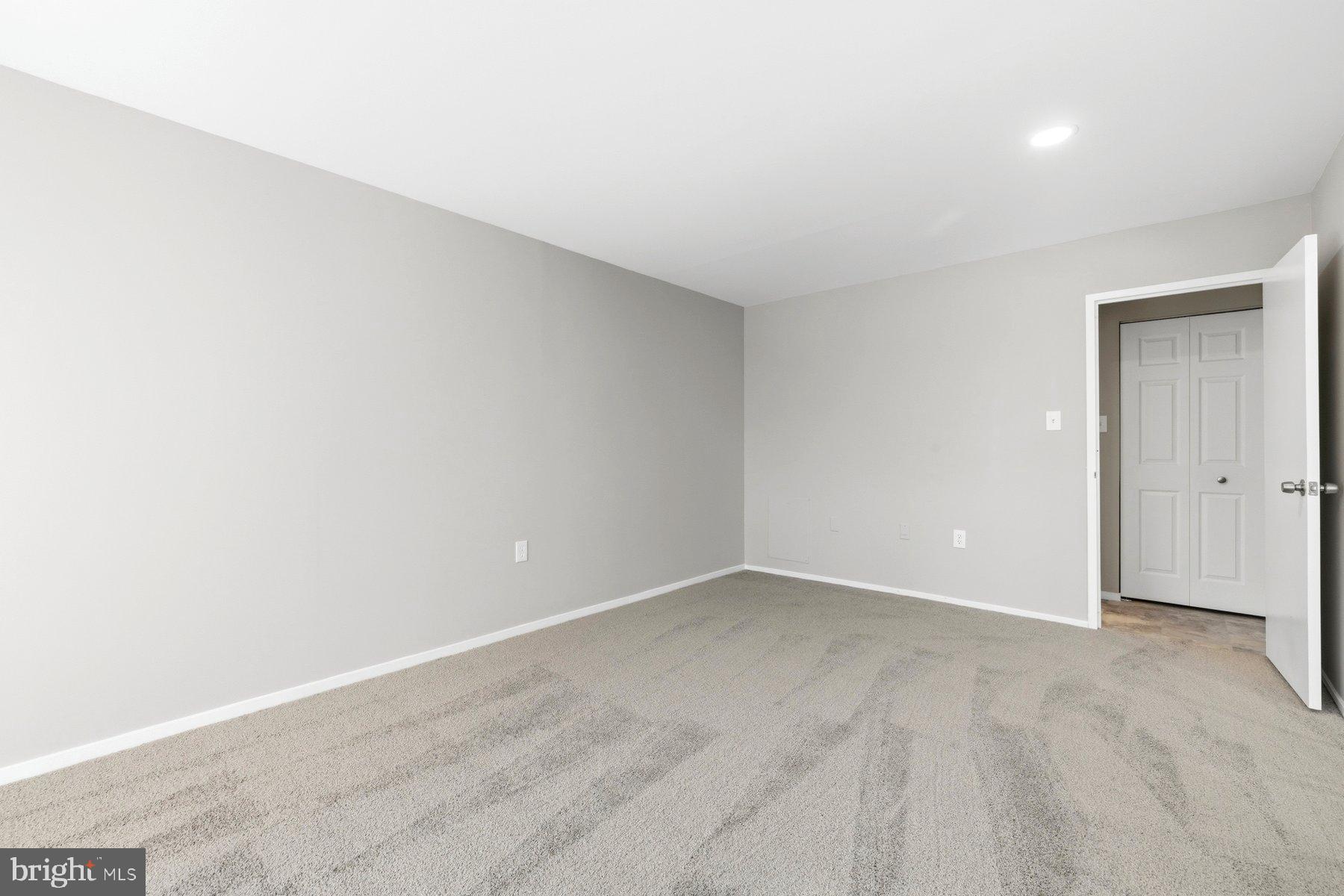 10026 Stedwick Road, Unit 201 Gaithersburg, MD 20886 - Photo 18 of 25 Spacious, versatile room ready for your vision.