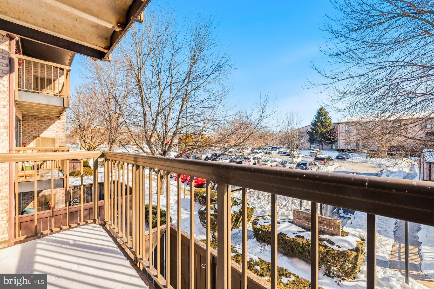 10026 Stedwick Road, Unit 201 Gaithersburg, MD 20886 - Photo 25 of 25 Sunny balcony view over winter landscape.