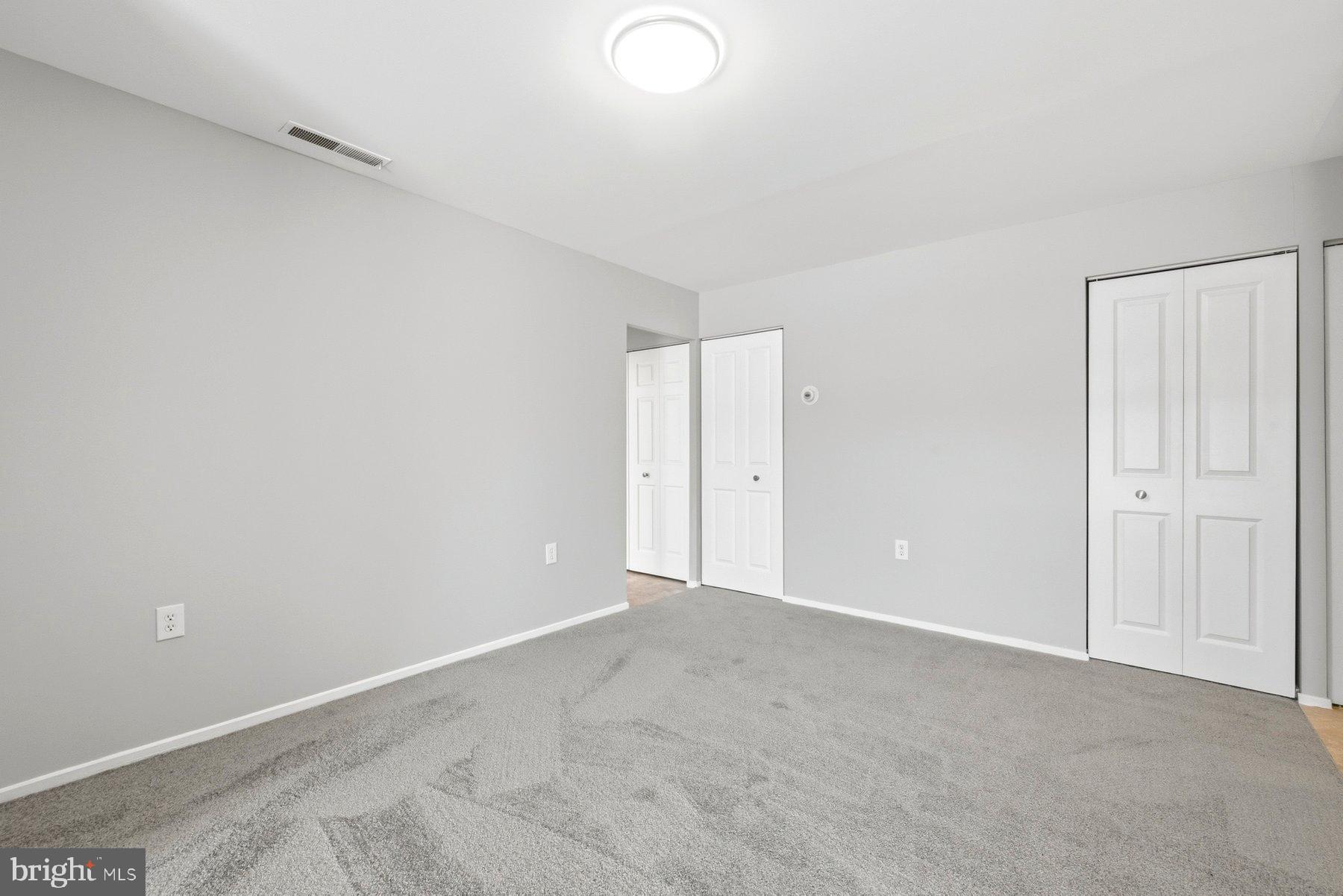 10026 Stedwick Road, Unit 201 Gaithersburg, MD 20886 - Photo 6 of 25 Spacious, versatile room ready for your vision.