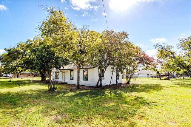 a view of swimming pool with an outdoor space and seating area