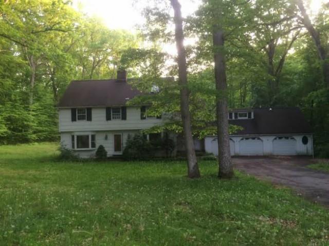 23 Chessor Lane Wilton, CT 06897 - Photo 1 of 1 a view of a yard in front of house