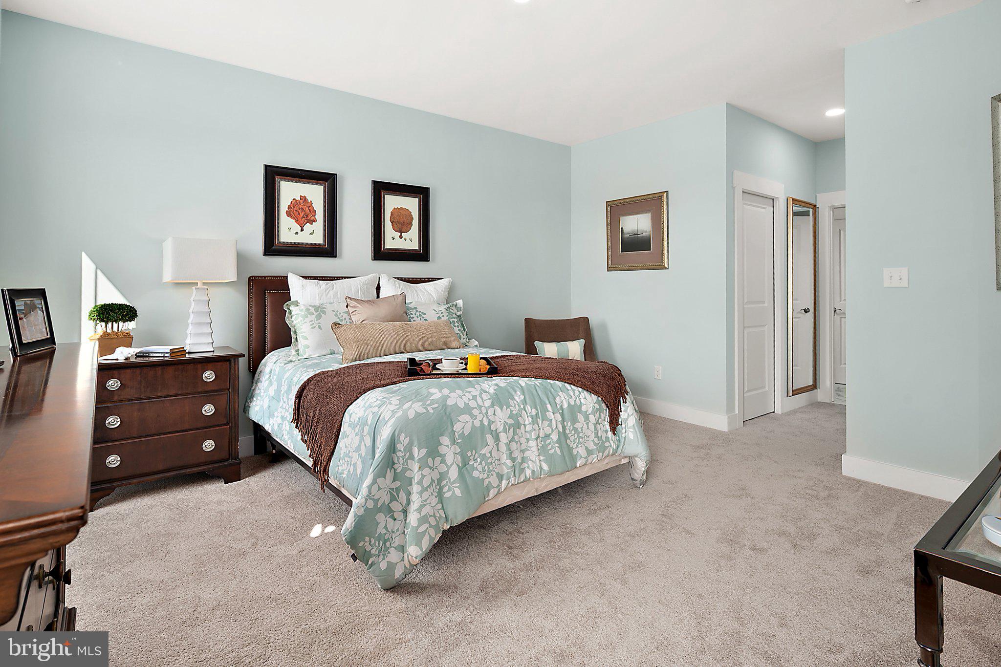 36022 Jackson Street Ocean View, DE 19970 - Photo 22 of 50 Serene bedroom with soft hues.