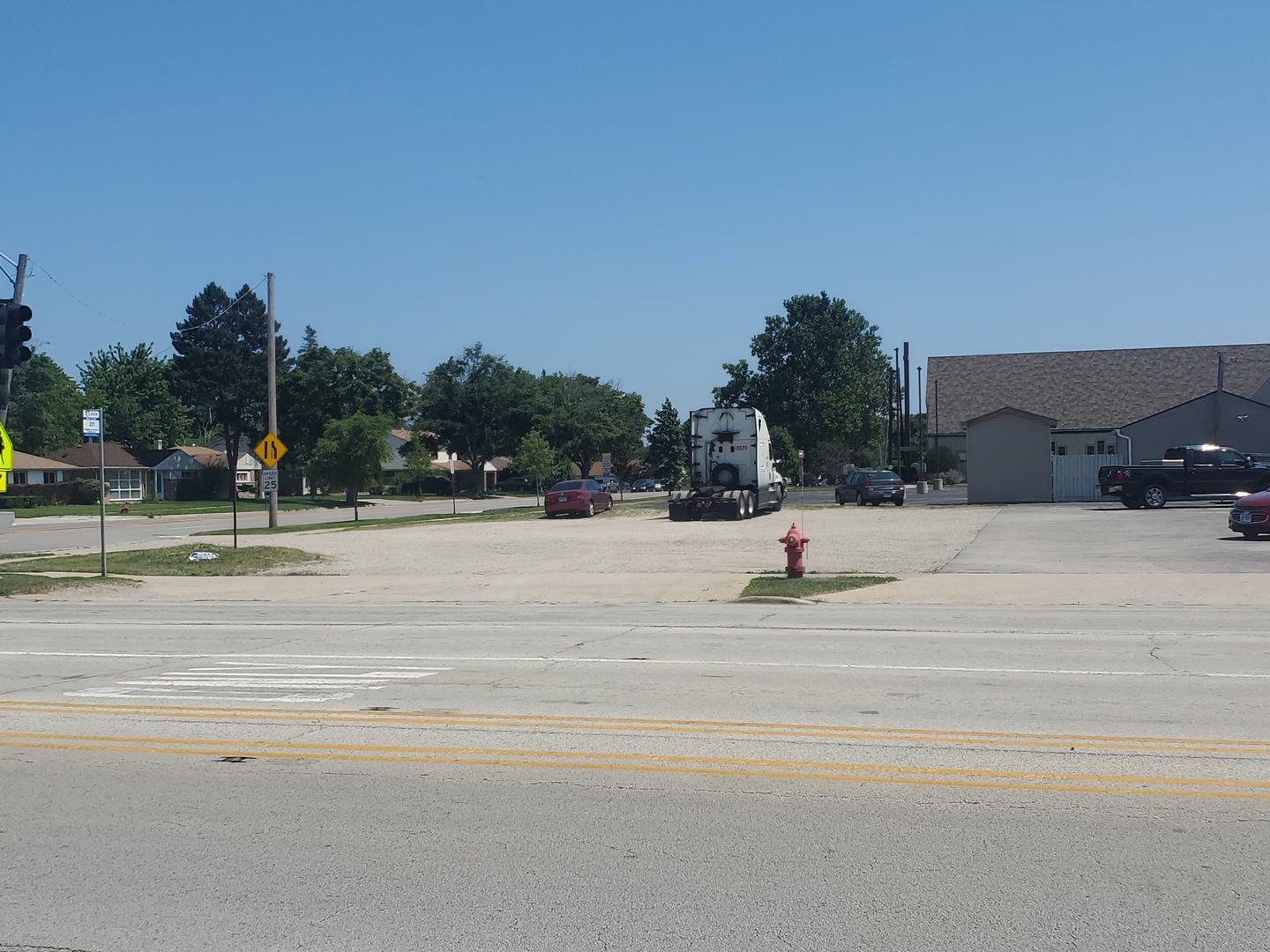 a view of road with yard