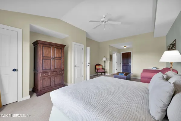 a kitchen with a sink a stove and cabinets