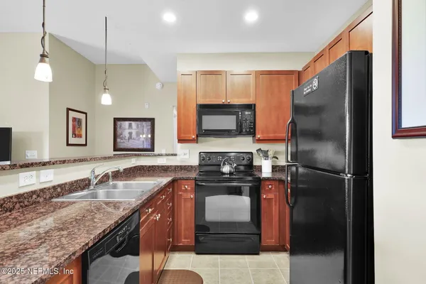 an aerial view of residential house with outdoor space