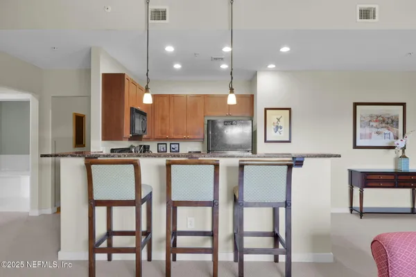 an aerial view of lake and city