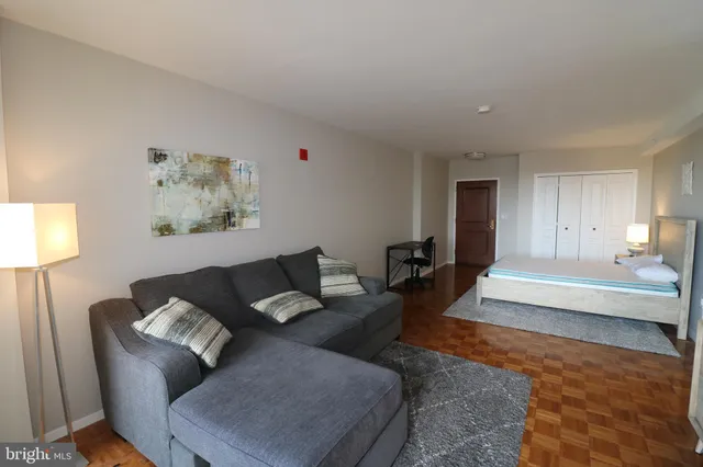 a living room with furniture and a couch