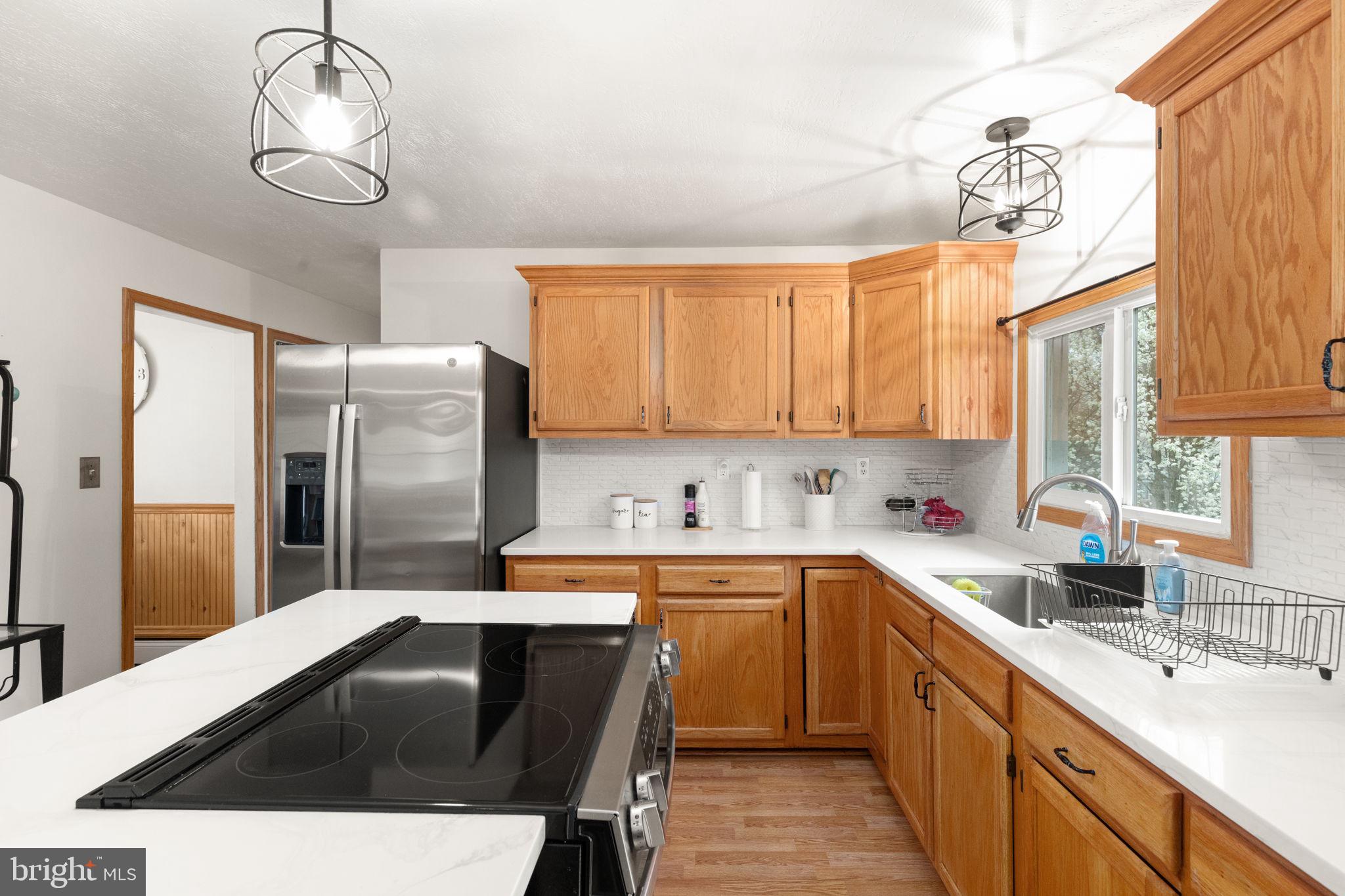 817 Tydings Road Havre de Grace, MD 21078 - Photo 14 of 42 Bright kitchen with warm wood tones.