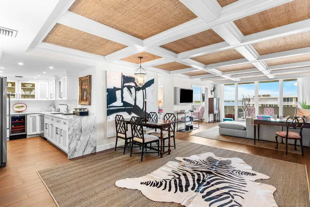 a large kitchen with stainless steel appliances granite countertop a stove and a sink