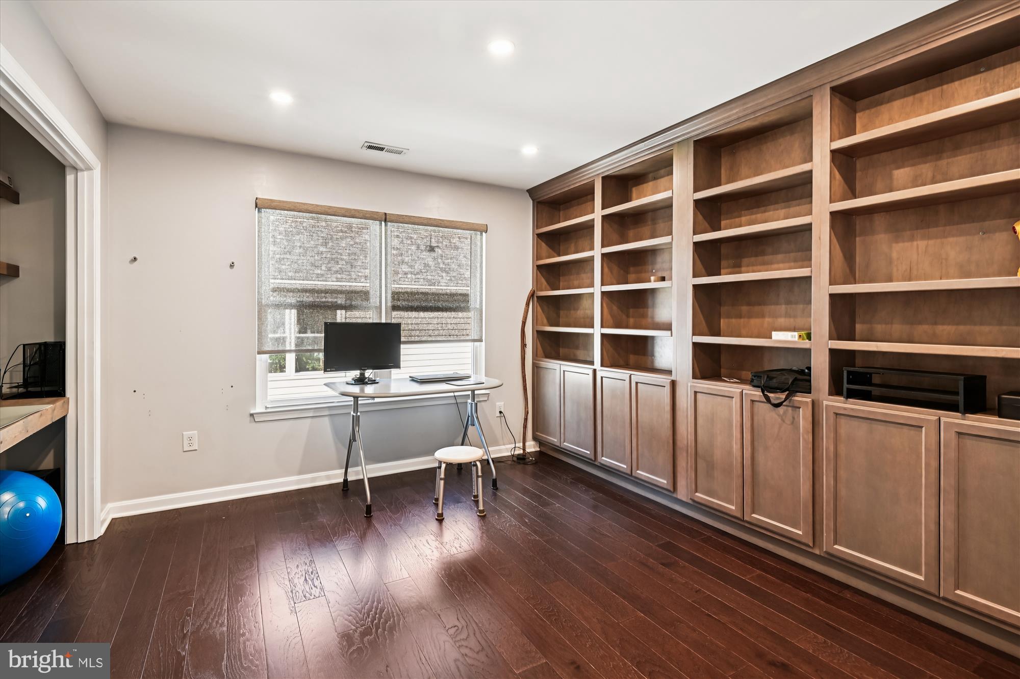2310 228th Street Pasadena, MD 21122 - Photo 23 of 45 a view of a workspace with furniture and a window